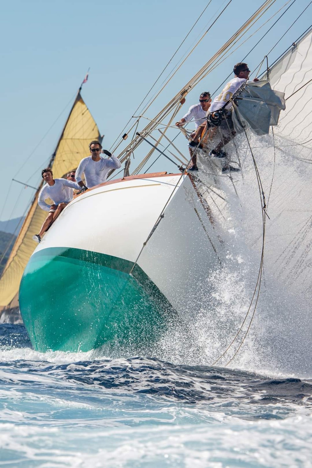 Classic yacht racing through the waves